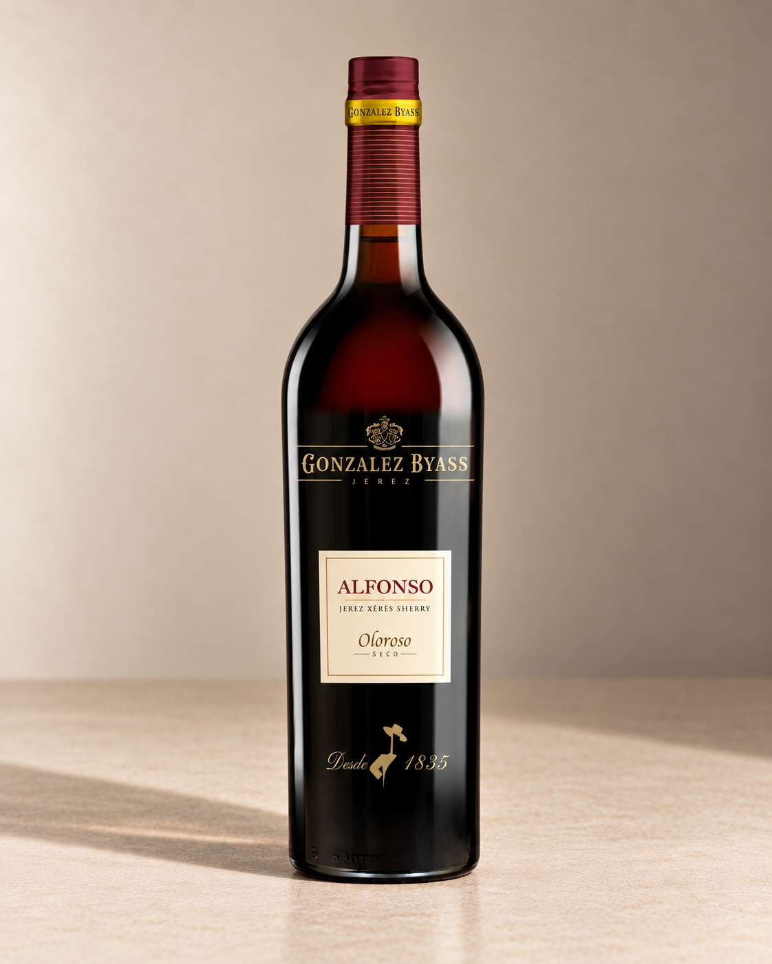 'Alfonso' Oloroso NV single wine bottle on a warm beige studio background