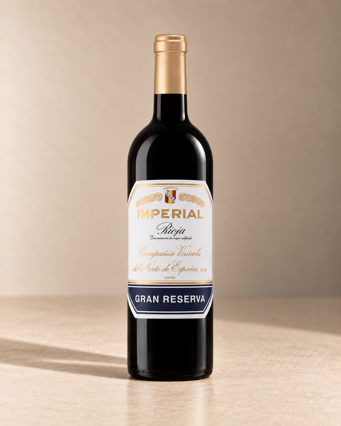 'Imperial' Gran Reserva 2017 single wine bottle on a warm beige studio background