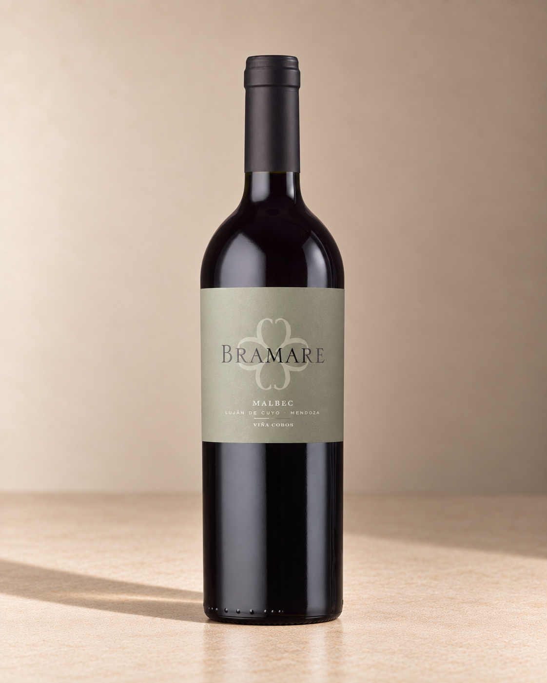 'Bramare' Malbec 2022 single wine bottle on a warm beige studio background
