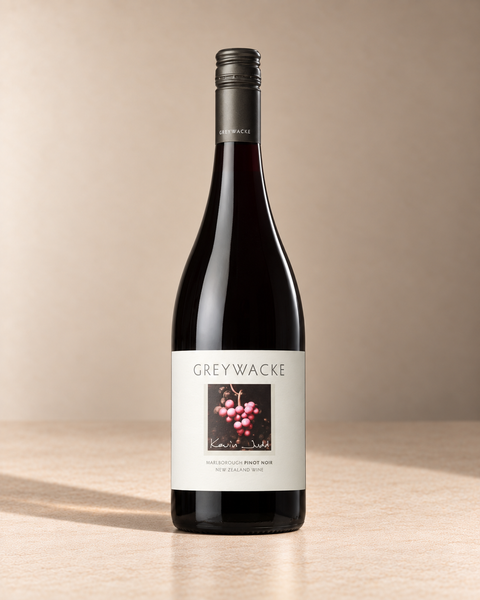 Pinot Noir 2017 - from magnum single wine bottle on a warm beige studio background