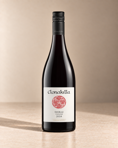 Shiraz-Viognier 2014 single wine bottle on a warm beige studio background