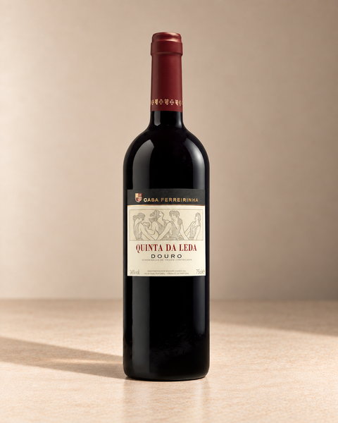 'Quinta da Leda' Touriga Blend 2019 - from magnum single wine bottle on a warm beige studio background