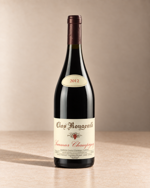 'Les Poyeux' Saumur-Champigny 2012 single wine bottle on a warm beige studio background