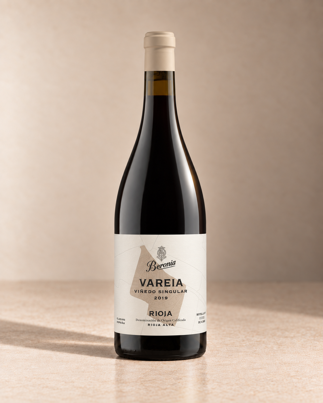'Vareia' Tempranillo 2019 single wine bottle on a warm beige studio background