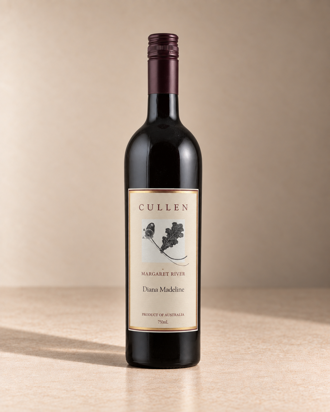 'Diana Madeline' Cabernet Blend 2014 single wine bottle on a warm beige studio background
