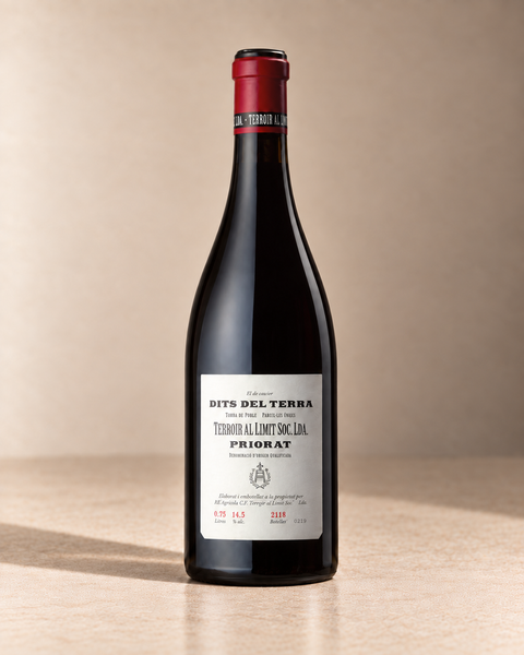 'Dits del Terra' Priorat 2022 single wine bottle on a warm beige studio background