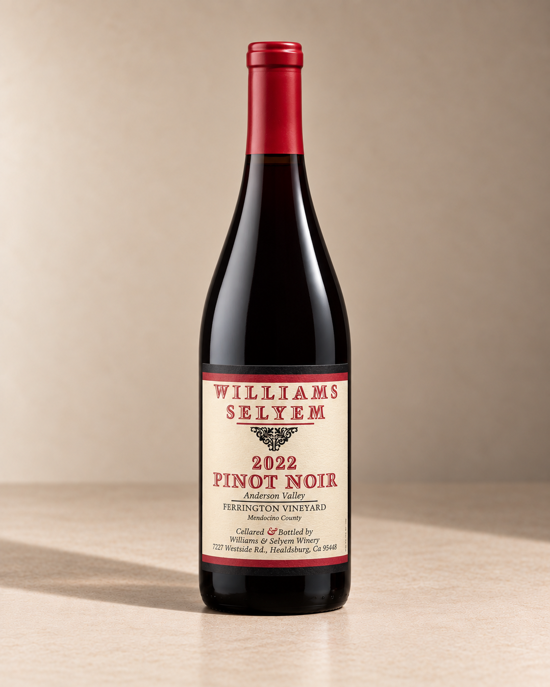 'Anderson Valley' Pinot Noir 2022 single wine bottle on a warm beige studio background