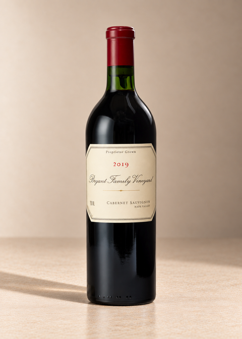Cabernet Sauvignon 2019 single wine bottle on a warm beige studio background