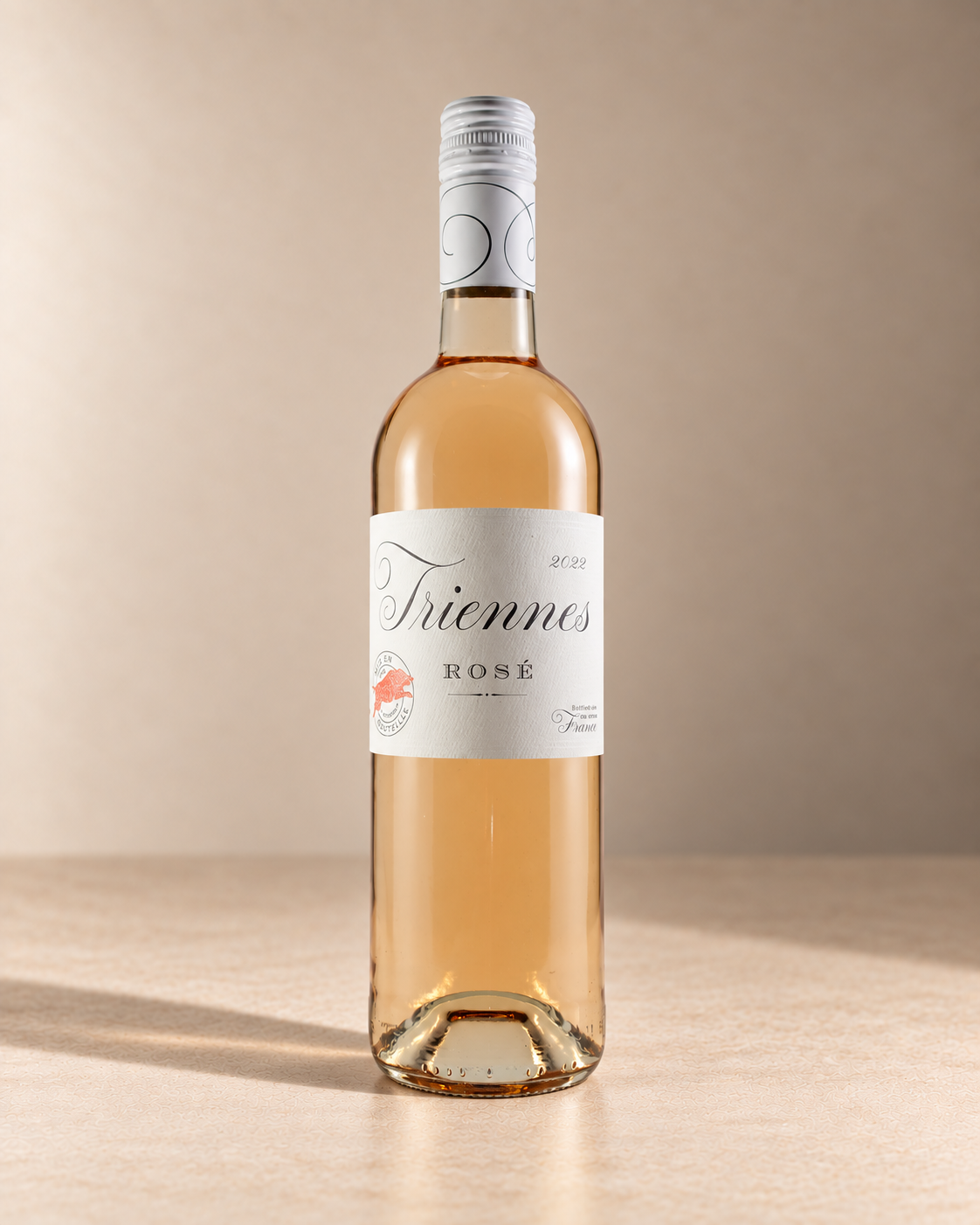 Rosé 2025 - from magnum single wine bottle on a warm beige studio background