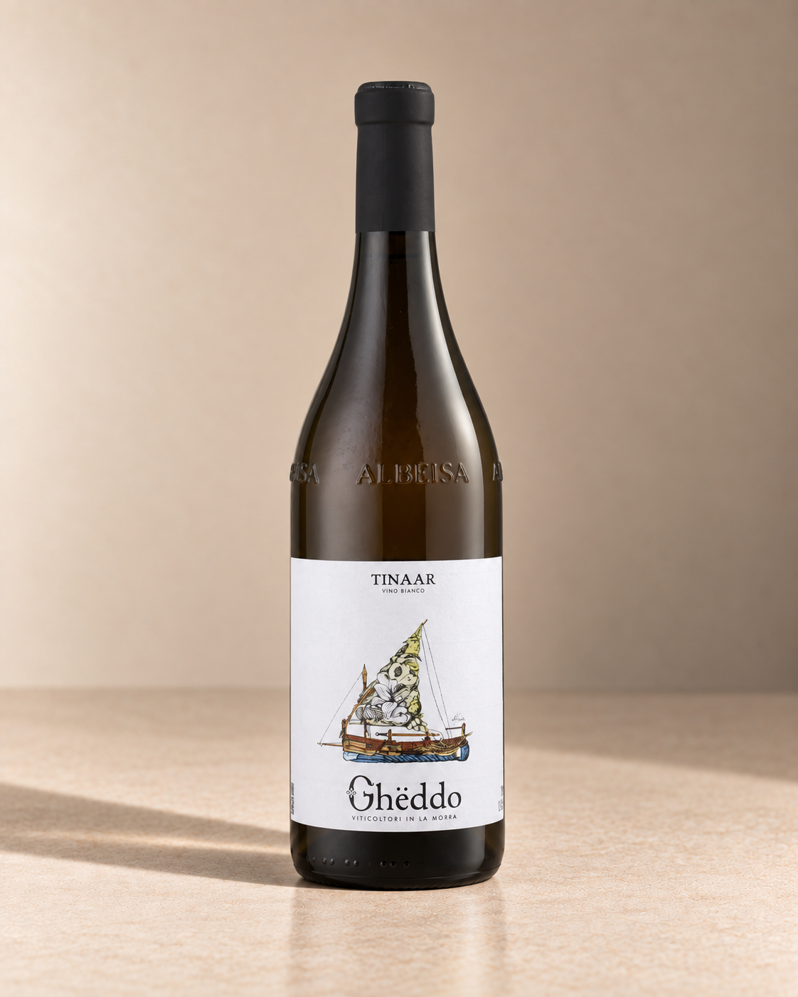 'Tinaar Bianco' White Blend 2023 single wine bottle on a warm beige studio background