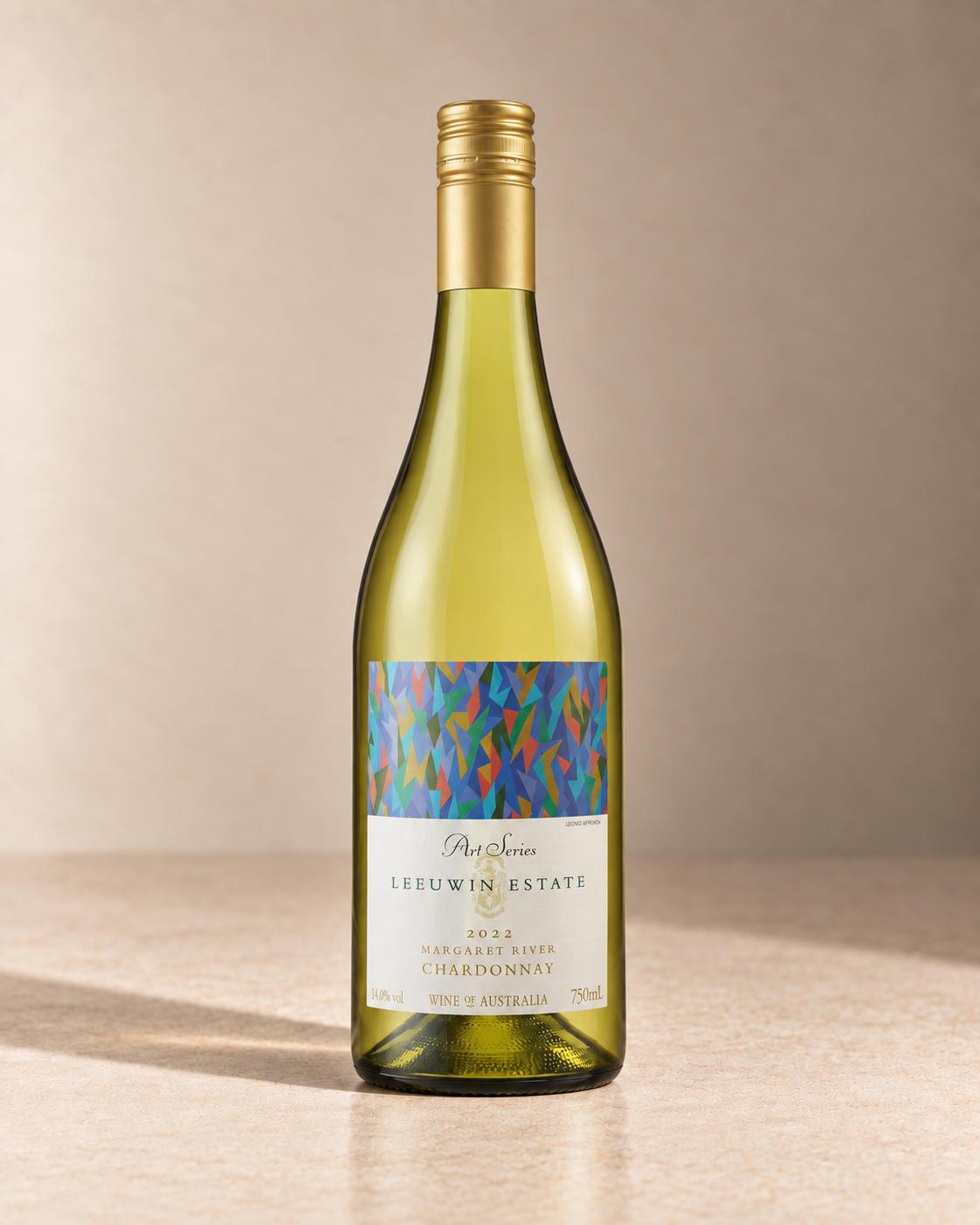 'Art Series' Chardonnay 2022 single wine bottle on a warm beige studio background