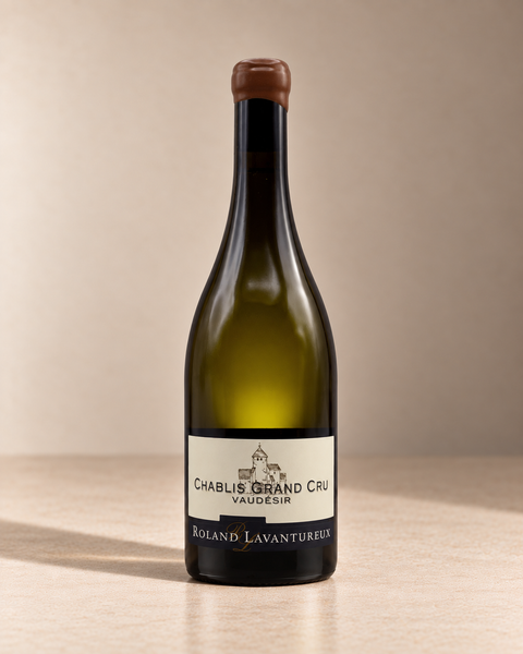 'Vaudesir' Chablis Grand Cru  2018 single wine bottle on a warm beige studio background