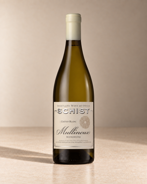 'Schist' Chenin Blanc 2023 single wine bottle on a warm beige studio background