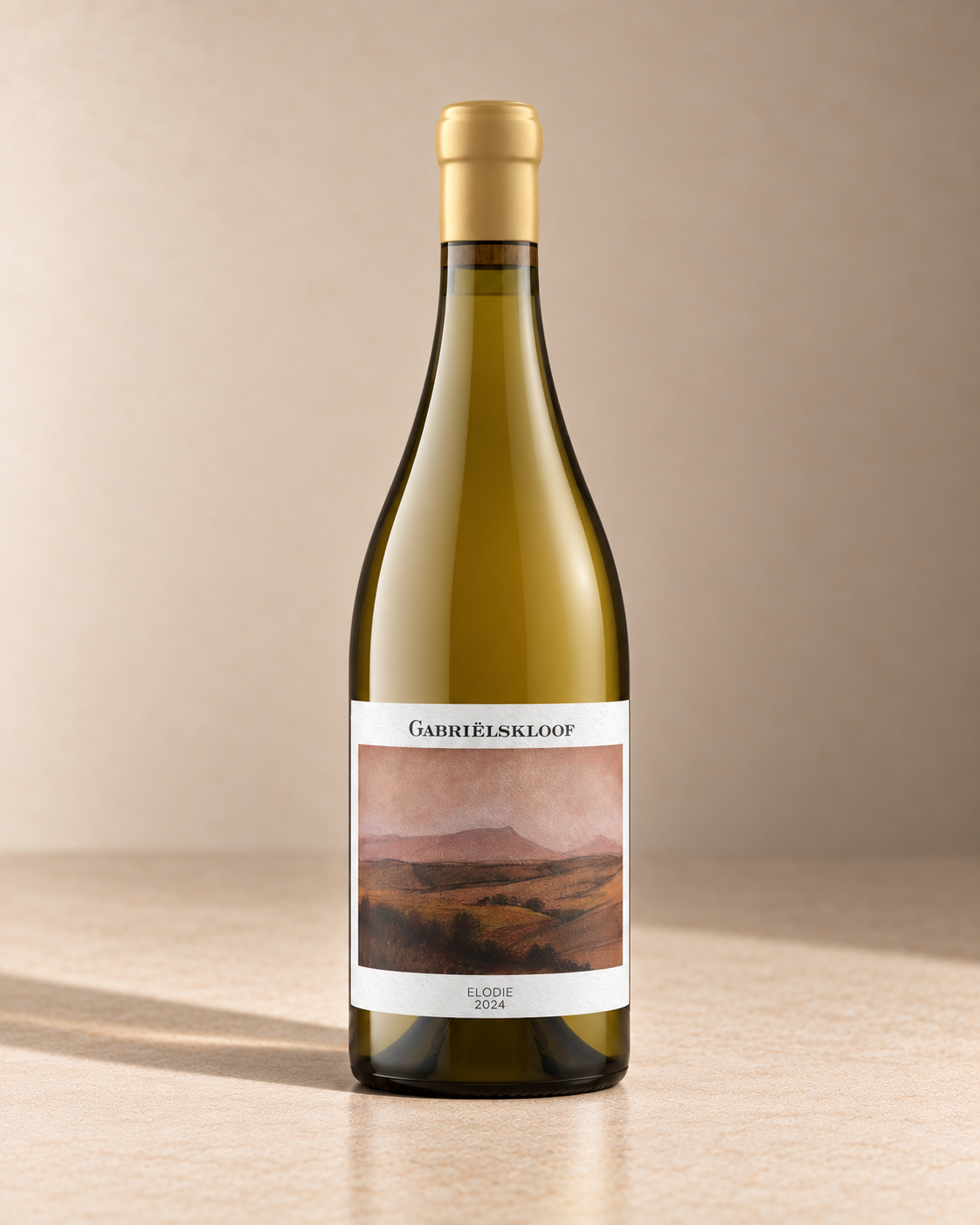 'Elodie' Chenin Blanc 2024 single wine bottle on a warm beige studio background