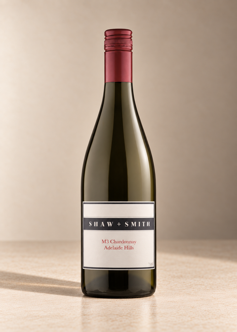 'M3' Chardonnay 2017 single wine bottle on a warm beige studio background