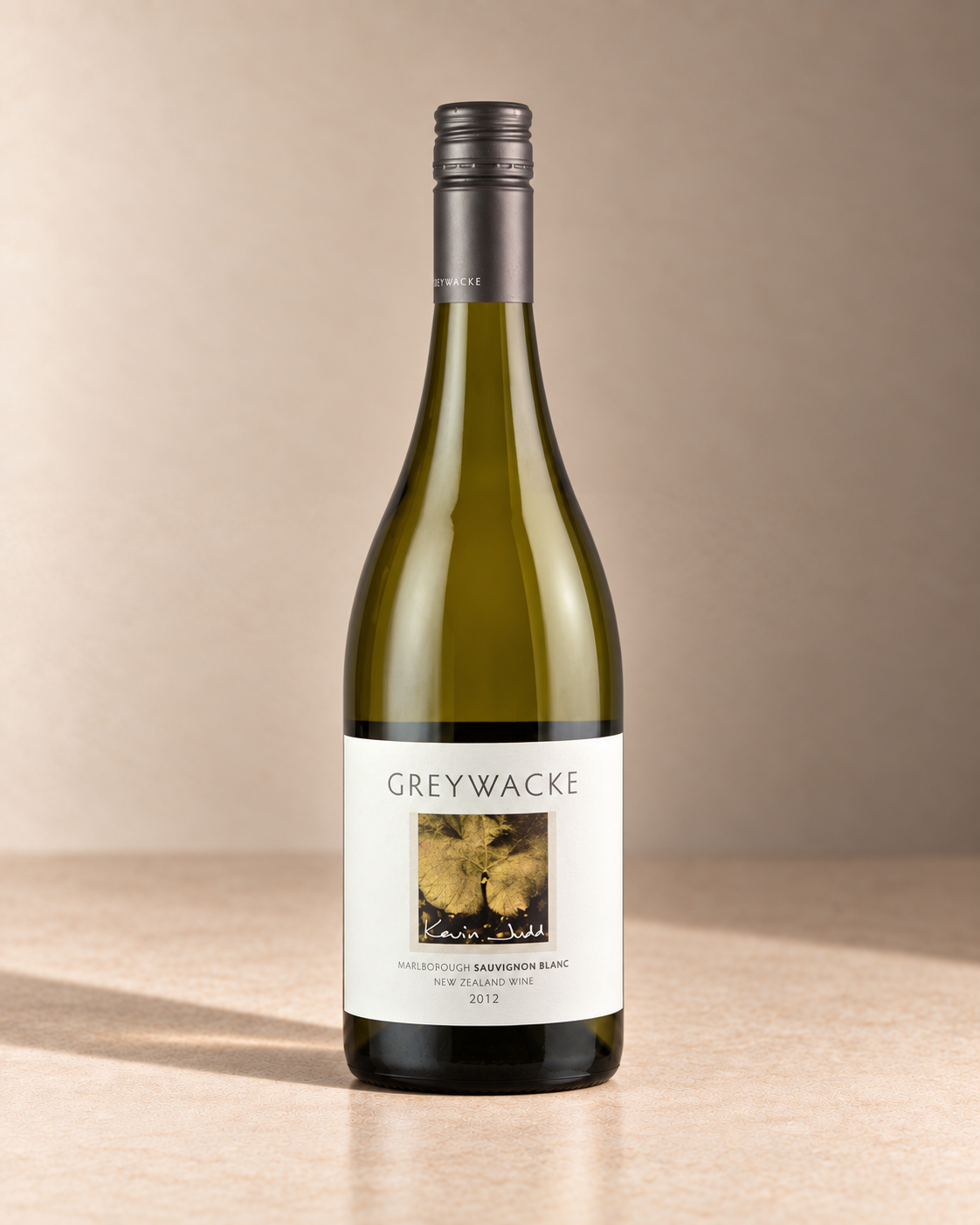 'Archive Release' Sauvignon Blanc 2015 single wine bottle on a warm beige studio background