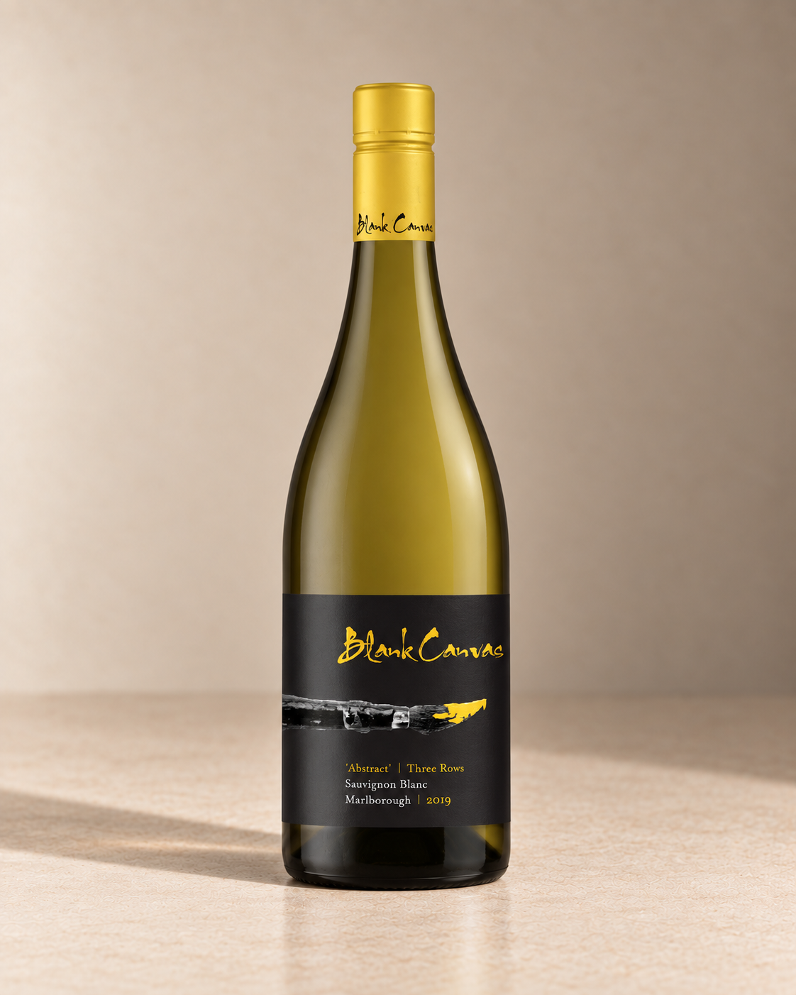 Blank Canvas Abstract Three Rows Sauvignon Blanc bottle on a warm beige studio background
