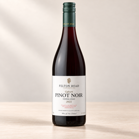 Representative Felton Road Calvert Pinot Noir bottle labelled 2022, shown alone on a warm beige studio background