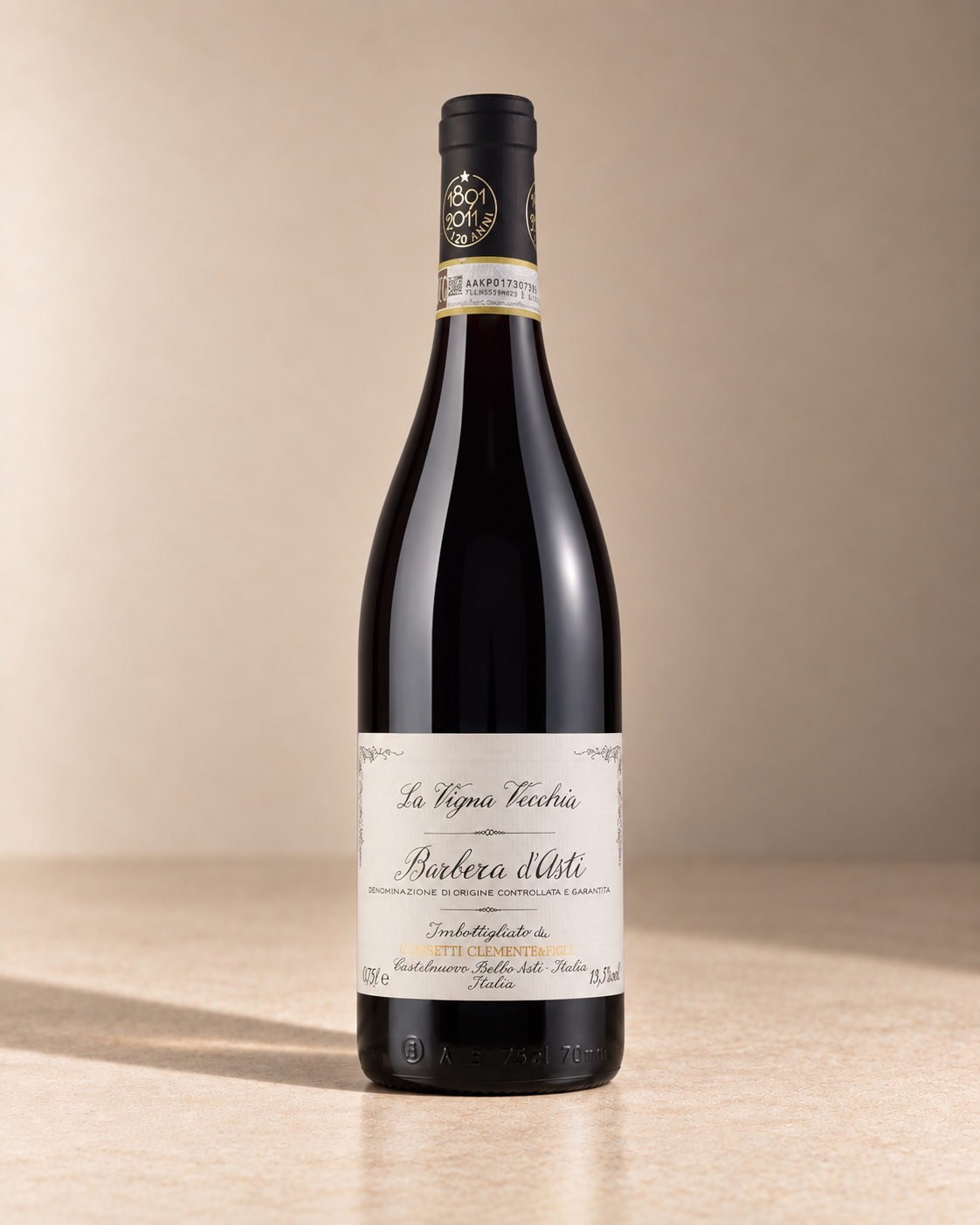 'La Vigna Vecchia' Barbera d'Asti Superiore 2022 single wine bottle on a warm beige studio background