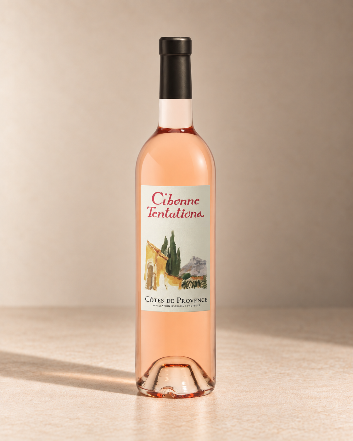 'Tentations' Rosé 2024 single wine bottle on a warm beige studio background
